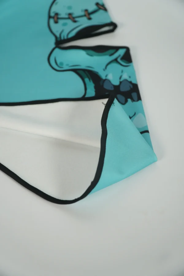 Interior fabric and stitching detail of custom printed skull balaclava – Textile Promos