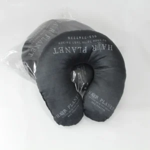 Black travel neck pillow with custom branding in transparent packaging – Textile Promos