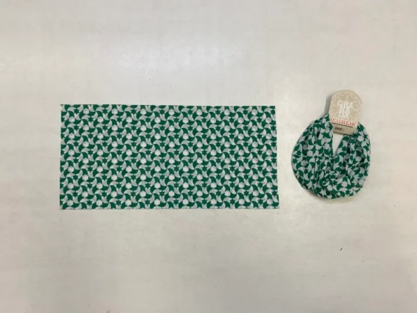 Green and white minimal geometric buff with leaf-like swirls