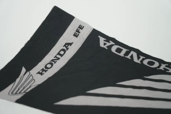 Close-up view of custom printed buff fabric – promotional textile product by Textile Promos