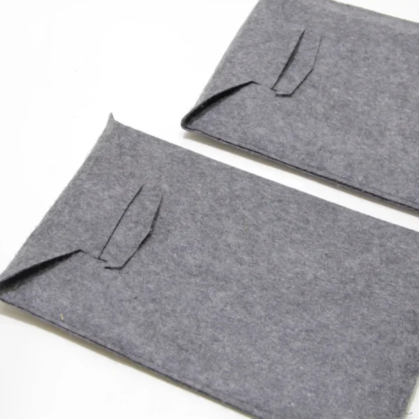 Two felt sleeves in different sizes and shapes – custom branded options by Textile Promos