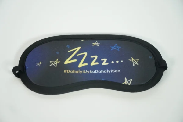 Close-up of sleep mask showing fabric texture and logo print – Textile Promos
