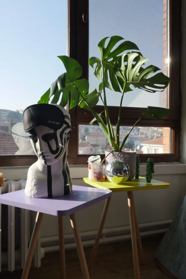 Sleep mask placed on a statue head – artistic promotional photoshoot by Textile Promos