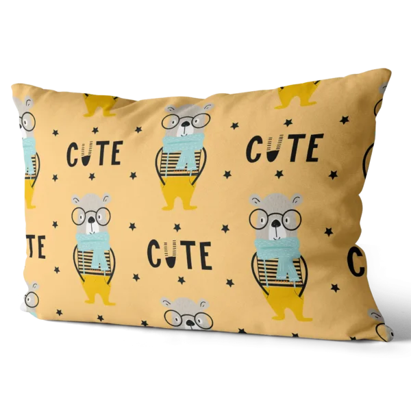 Toddler pillow with yellow background featuring illustrated bear with glasses and scarf and the word "CUTE"